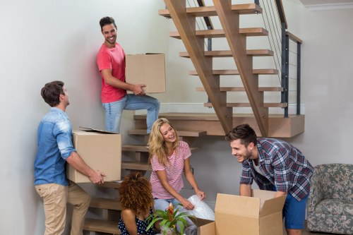 Moving van and crew planning a Paddington house removal