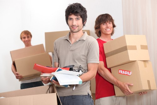 Packed office boxes and equipment ready for transport