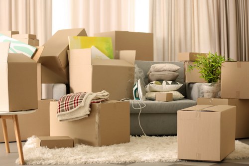 Loading furniture into a moving van in Paddington