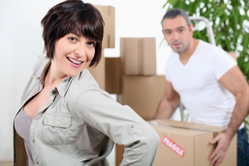 Office furniture and packed boxes ready for a Paddington commercial move